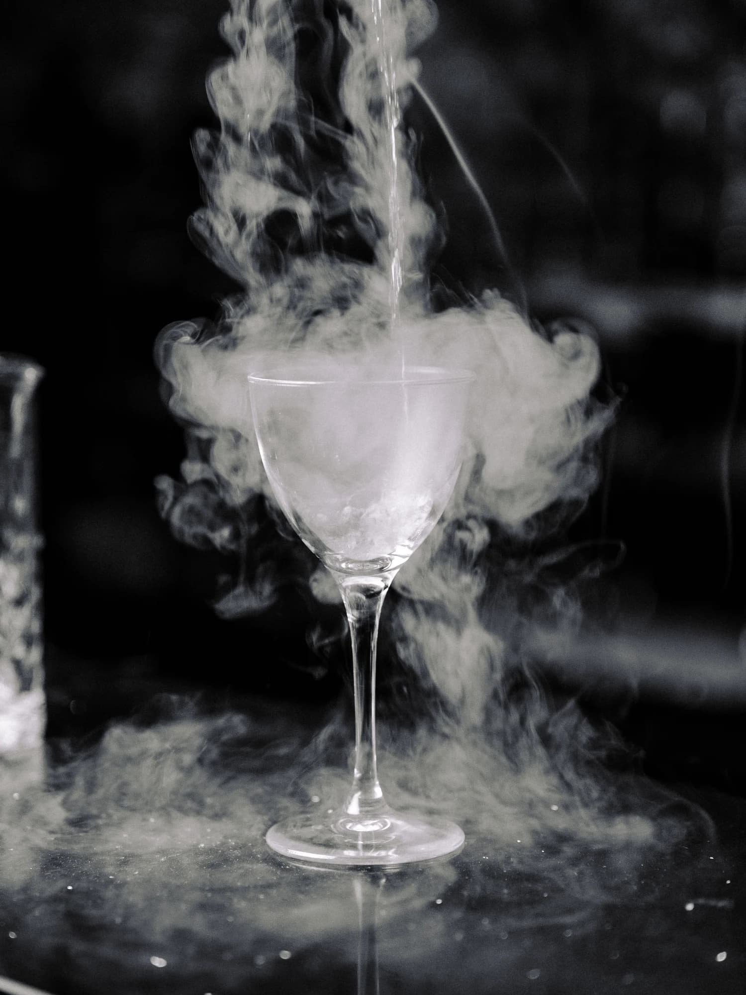 A chilled martini glass with vapour rising above it at Circa 1884’s bar.
