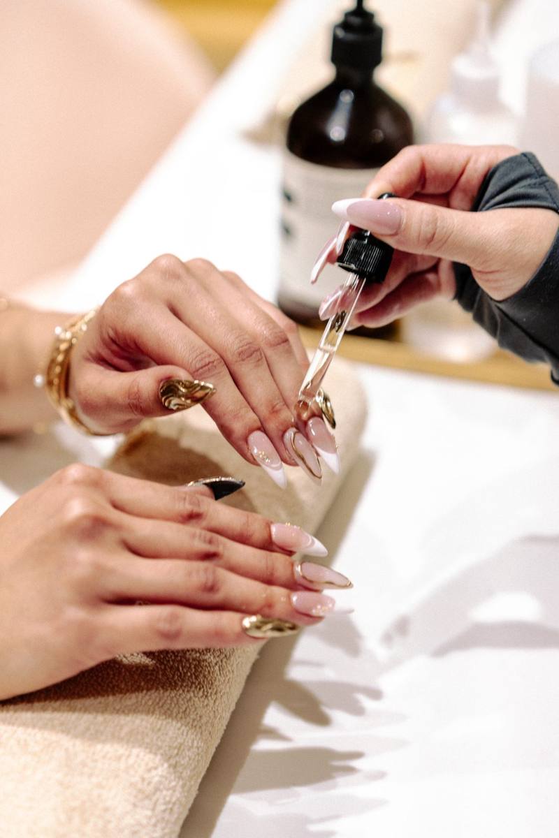 Twin Beauty — nail treatment and cuticle oil application