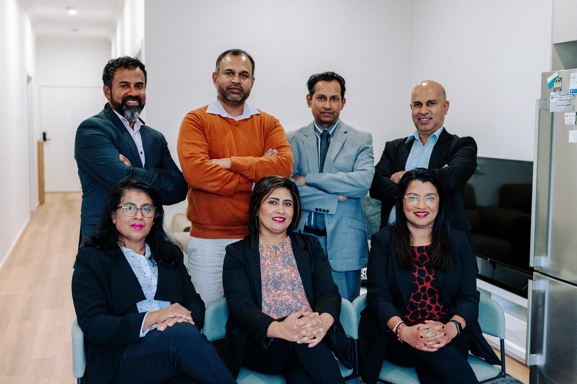 The MyDSP team photographed together in a lounge room